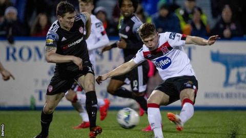 Derry's Ciaran Coll and Dundalk's Cammy Smith