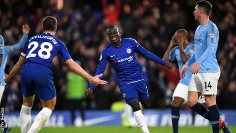 Chelsea players celebrate scoring against Manchester City