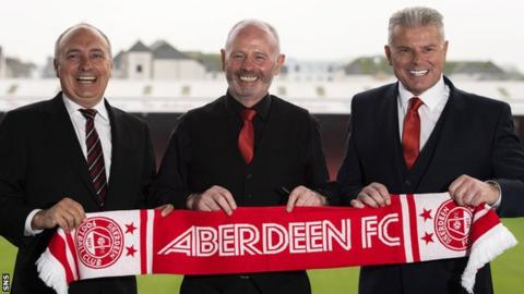 Atlanta United president Darren Eales, outgoing Aberdeen chairman Stewart Milne and incoming chairman Dave Cormack