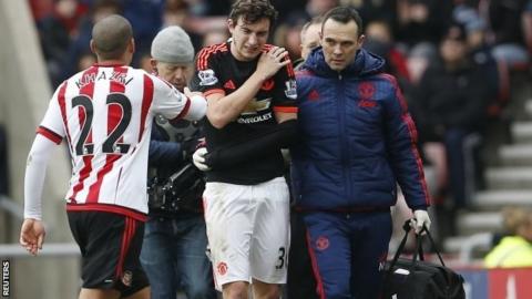 Matteo Darmian is helped off at Sunderland