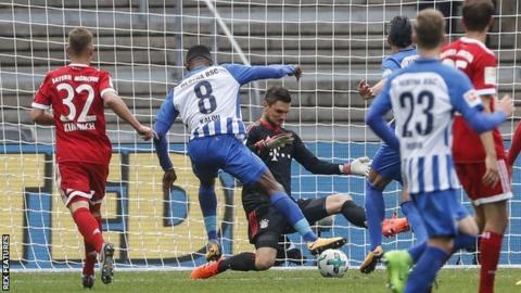 Hertha's Salomon Kalou (C) equalises for the hosts as Bayern's impressive first half was undone in Berlin