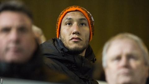 Bilel Mohsni watches Dundee United play at Tannadice