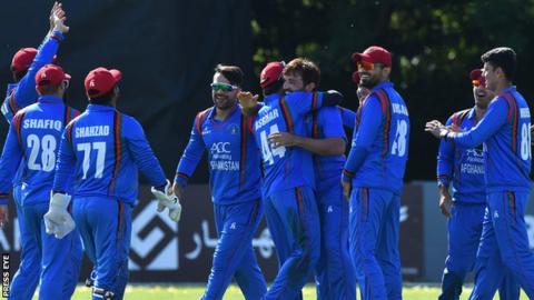 Afghanistan celebrate taking an Ireland wicket in the final ODI at Stormont on Friday