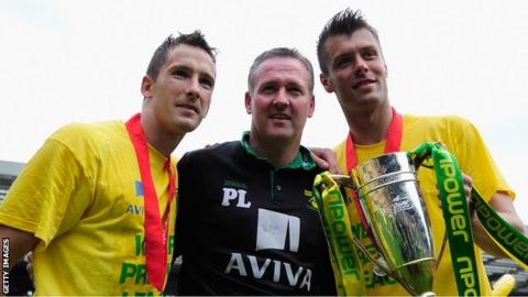 Paul Lambert (centre) led Norwich City to back-to-back promotions from League One to the Premier League in 2009-10 and 2010-11