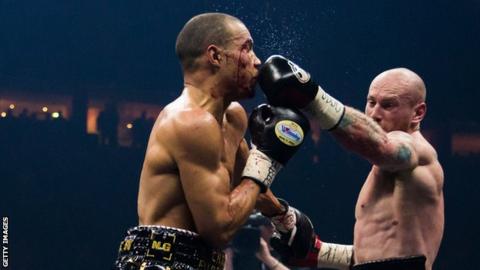 George Groves (right) lands a punch on Chris Eubank Jr