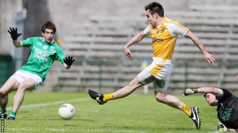 Kevin Niblock strokes in a goal in Antrim's Ulster SFC win over Fermanagh two years ago