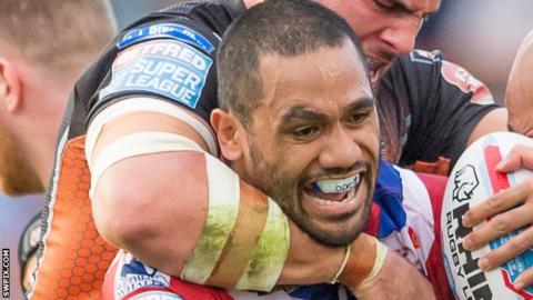 Bill Tupou is wrestled by Mike McMeeken