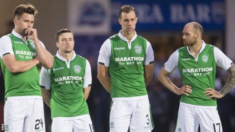 Hibs' Darren McGregor, Lewis Stevenson, Steven Whittaker and Martin Boyle watch as they lose the shoot-out