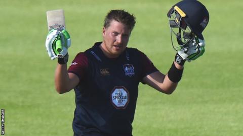 Josh Cobb celebrates a century for Northamptonshire