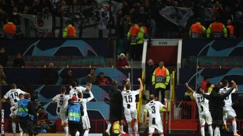 Disabled Manchester United supporters below Juventus fans at Old Trafford