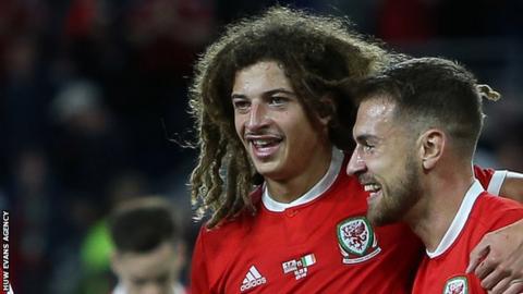 Ethan Ampadu and Aaron Ramsey celebrate