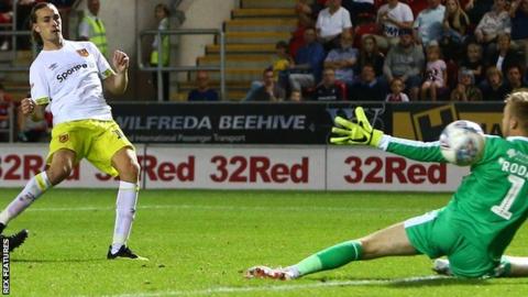 Hull midfielder Jackson Irvine scores against Rotherham