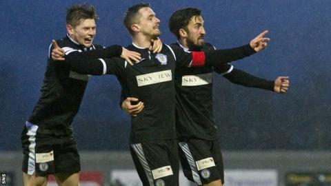 St Mirren captain Stephen McGinn celebrates scoring against Dumbarton