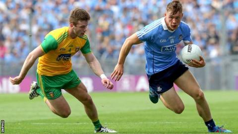 Donegal defender Eoghan Ban Gallagher tries to keep pace with Dublin forward Con O'Callaghan