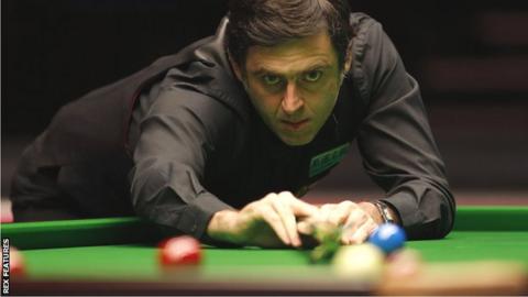 Ronnie O'Sullivan lines up a shot