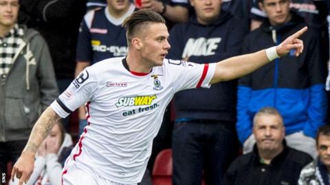 Miles Storey celebrates scoring for Inverness Caledonian Thistle