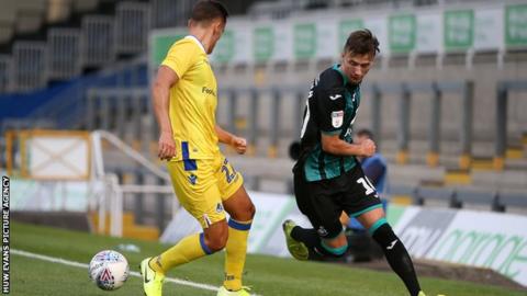 Bersant Celina launches a Swansea attack against Bristol Rovers