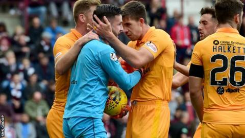 Liam Kelly saved a Steven Naismith penalty in first half stoppage time