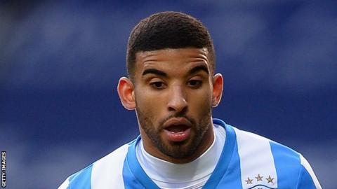 Oscar Gobern plays for Huddersfield Town against Charlton Athletic in the FA Cup in 2014