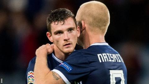 Andy Robertson and Steven Naismith embrace
