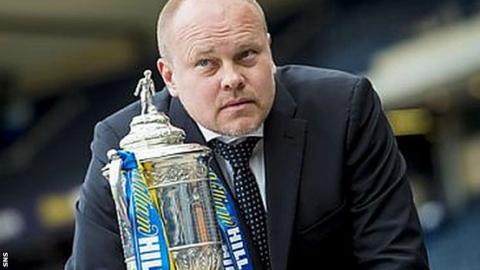 Dundee United manager Mixu Paatelainen poses with the Scottish Cup