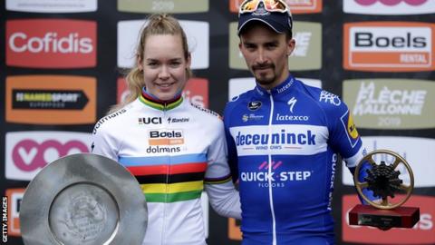 Fleche Wallonne winners Anna van der Breggen (left) and Julian Alaphilippe (right) pose with their trophies