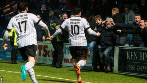 Stephen Mallan celebrates scoring