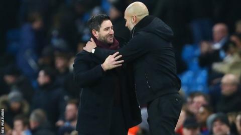 Bristol City boss Lee Johnson and Manchester City's Pep Guardiola