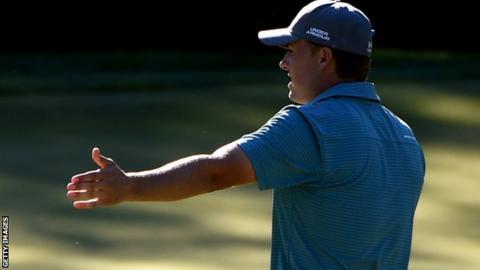 Jordan Spieth reacts to a missed putt
