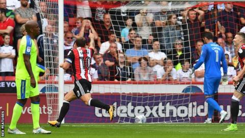 Billy Sharp celebrates his goal against Derby