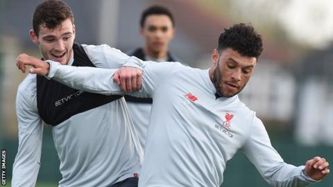 Liverpool midfielder Alex Oxlade-Chamberlain (right) in action during training with team-mate Andy Robertson