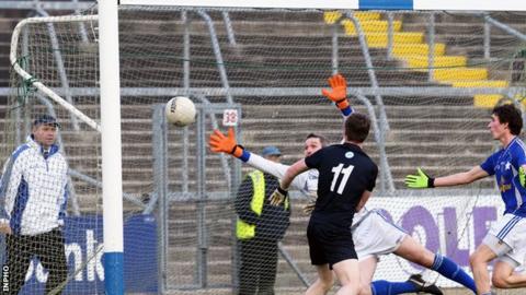 Paul Devlin fires in Kilcoo's opening goal against Kingscourt