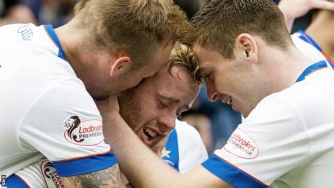 Kilmarnock's Rory McKenzie (centre) celebrates his goal after his cross was deflected into the net