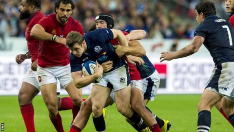 Mark Bennett is tackled by Alexandre Dumoulin in the 19-16 defeat to France