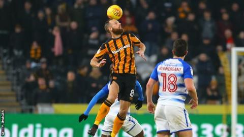David Meyler wins a header for Hull against Reading