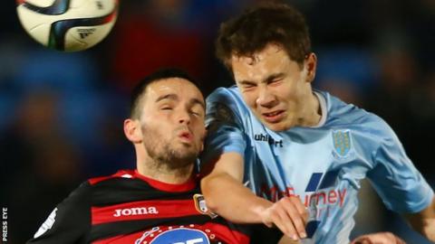 Coleraine's Neil McCafferty competes against Eoin Kane of Ballymena
