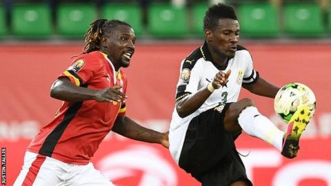 Asamoah Gyan (right)