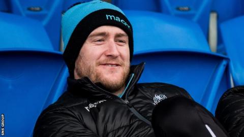 Stuart Hogg looks on from the Scotstoun stands during Tuesday's training session