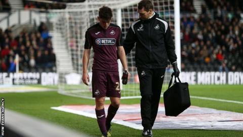 Daniel James limping off