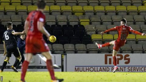 Reghan Tumilty scores