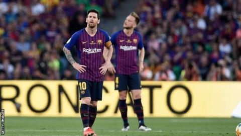 Lionel Messi (left)