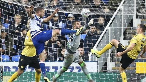 Keeper punches ball clear