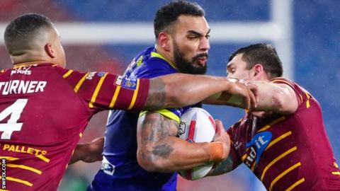 Warrington's Ryan Atkins is tackled