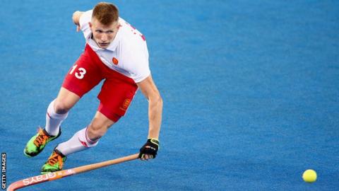 Sam Ward playing hockey