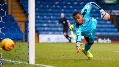 Swindon's Lawrence Vigouroux is one of three goalkeepers in Chile's 24-man squad