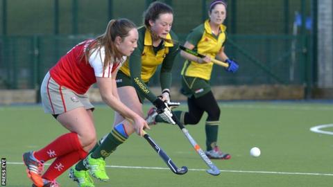 Rosie Henderson of Pegasus and Railway Union's Grace McLoughlin battle for possession in the Belfast clash