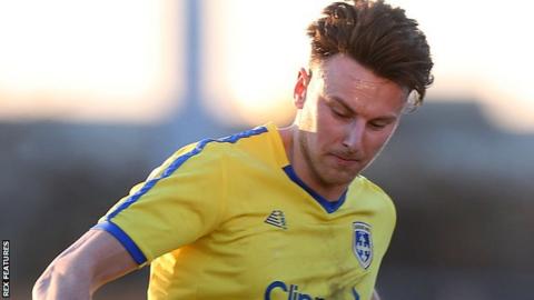 Jake Lawlor in action for Guiseley