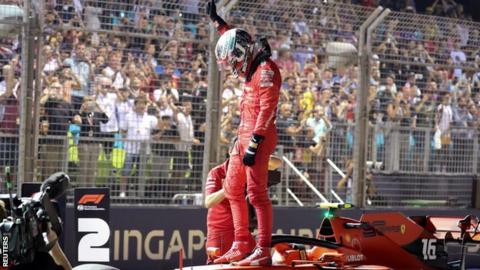 Charles Leclerc celebrates pole in Singapore