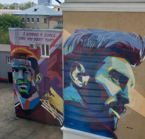 Cristiano Ronaldo and Lionel Messi murals
