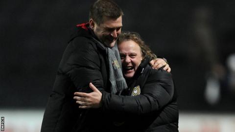 Karl Robinson and Pete Winkelman